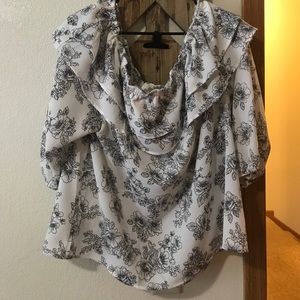 Off the shoulder white and black shirt